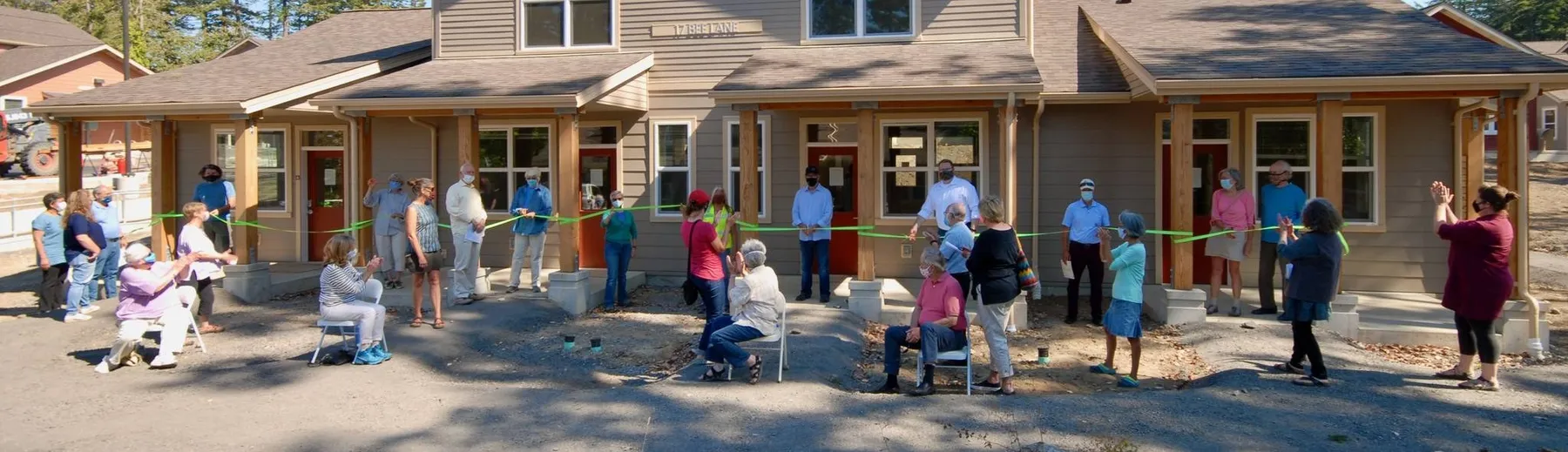 Residents and guests gathered in the courtyard at the April’s Grove opening