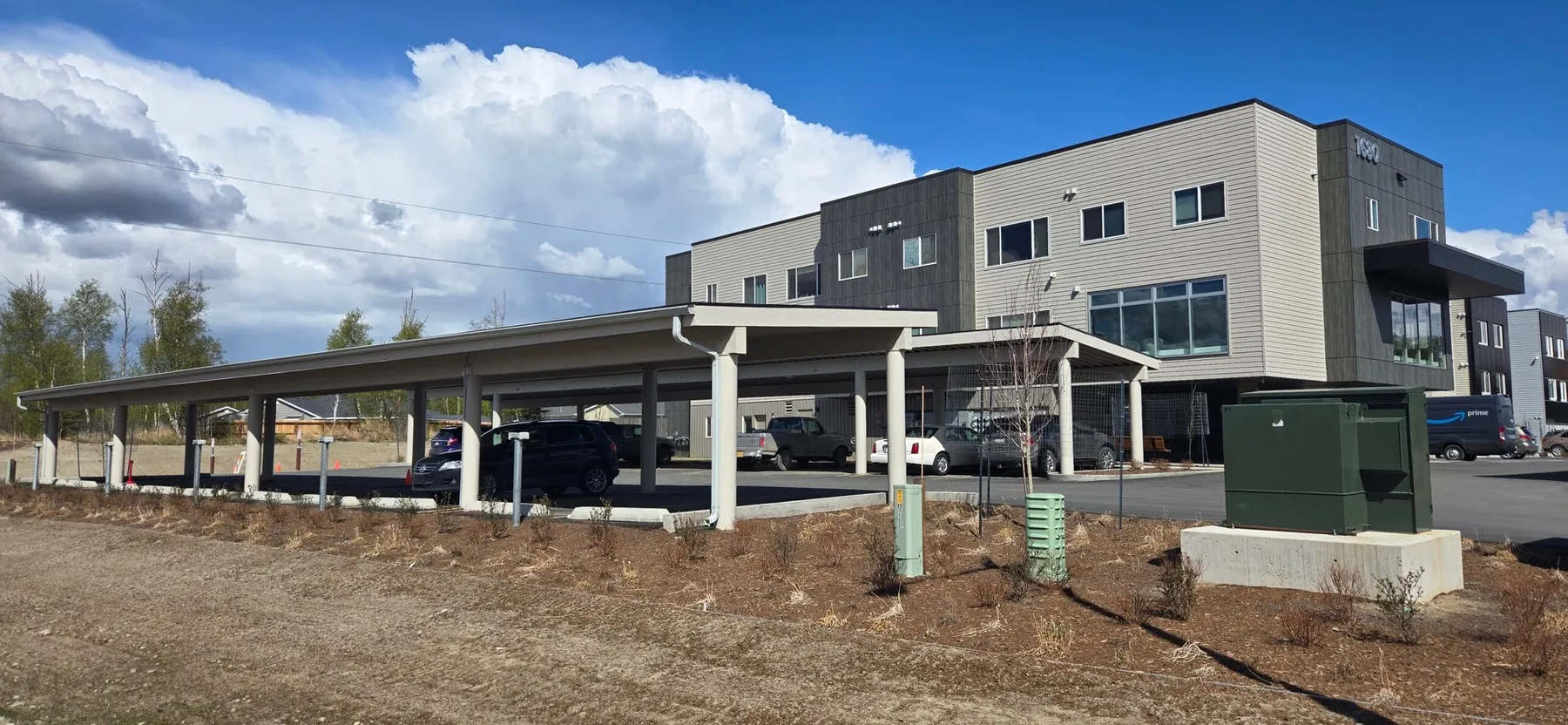 Aspen Housing carports and apartment building with new landscaping