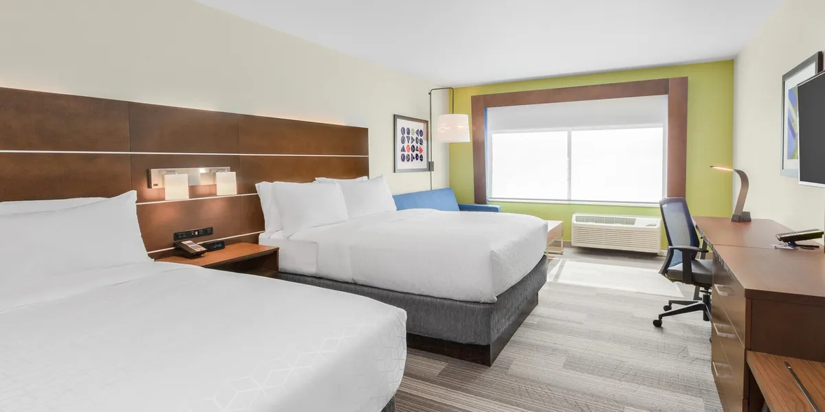 Holiday Inn Express guest room with two beds and a work desk